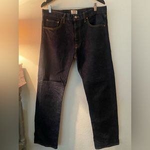 Levi 501’s… dark blue jeans